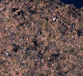 Dunite specimen: olive green and yellowish green igneous rock
