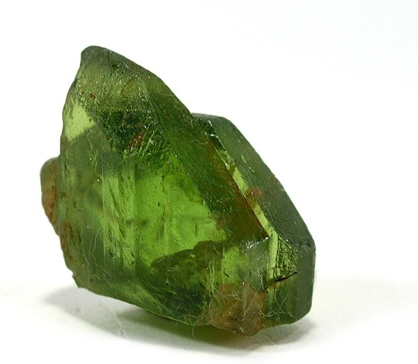 Forsterite specimen Forsterite specimen: pale yellow-green and olive green mineral