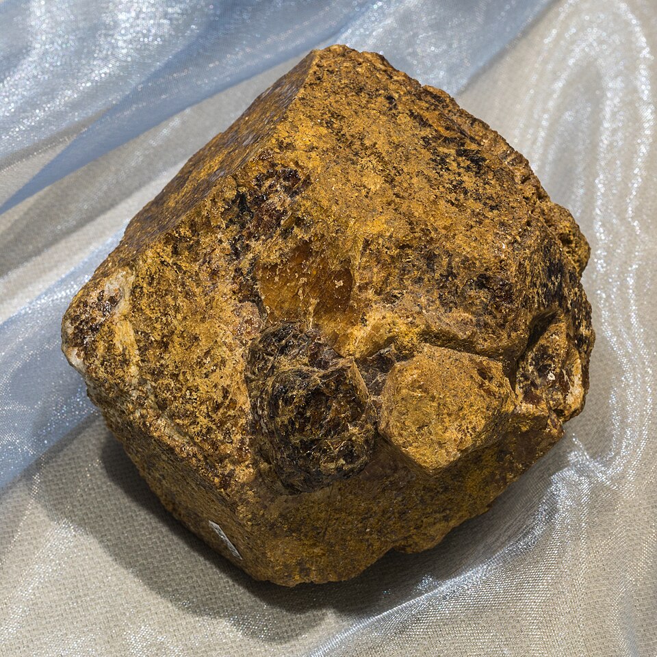 Hessonite specimen Hessonite specimen: orange-brown and cinnamon mineral