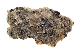Iolite specimen: violet-blue and blue gemstone