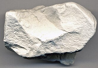 Kaolinite specimen Kaolinite specimen: white and cream mineral (photo 2)