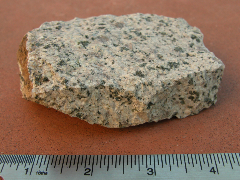 Monzonite specimen: gray and pink igneous rock