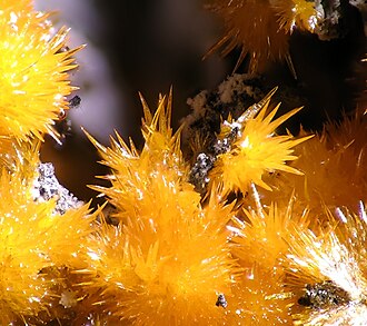 Orpiment specimen: lemon yellow and golden yellow mineral