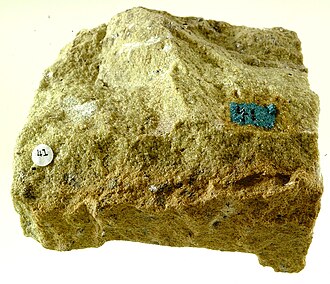 Peridotite specimen: green and dark green igneous rock