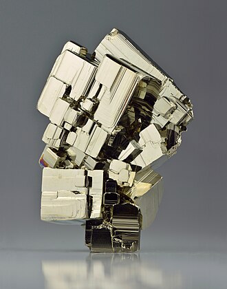 Pyrite specimen: brass yellow and pale gold mineral