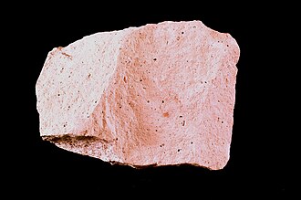 Rhyolite specimen: pink and gray igneous rock
