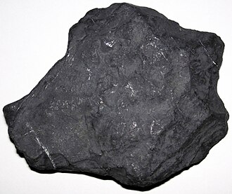 Shungite specimen: black and dark gray sedimentary rock