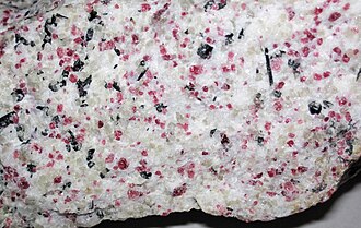 Syenite specimen: gray and pink igneous rock