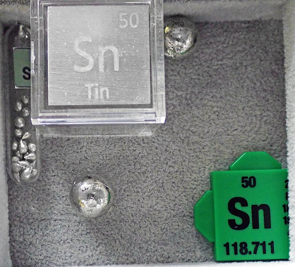 Tin specimen Tin specimen: silver and gray metal