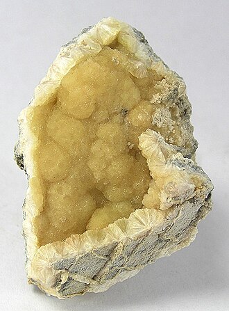 Wavellite specimen: green and yellow mineral