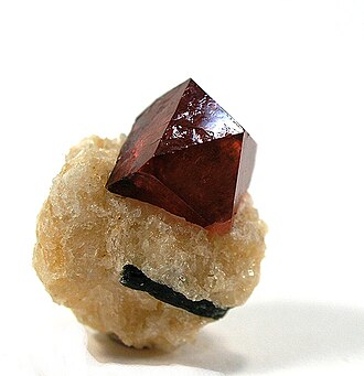 Zircon specimen: colorless and blue gemstone